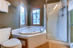 Master bath with a jetted tub.